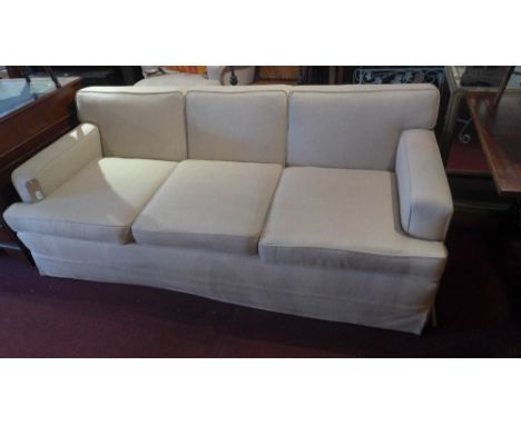 A contemporary three seater sofa upholstered in oatmeal coloured fabric, W 200 x D 90 x H 75cm  