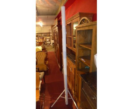 A large white Luxberg projector screen