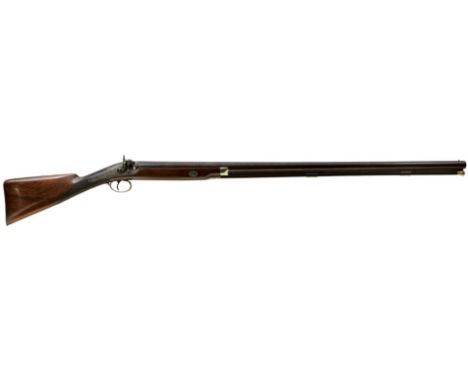 A 7-BORE PERCUSSION DUCK GUN BY WILLIAM &amp; JOHN RIGBY, 42inch sighted damascus barrel with platinum lined foliate engraved