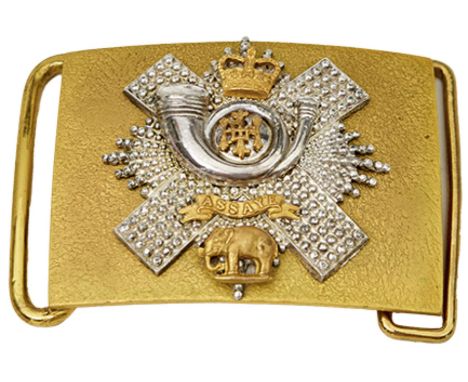 A HIGHLAND LIGHT INFANTRY WAIST BELT CLASP, the stippled gilt plate applied with a faceted white metal rayed star, gilt crown