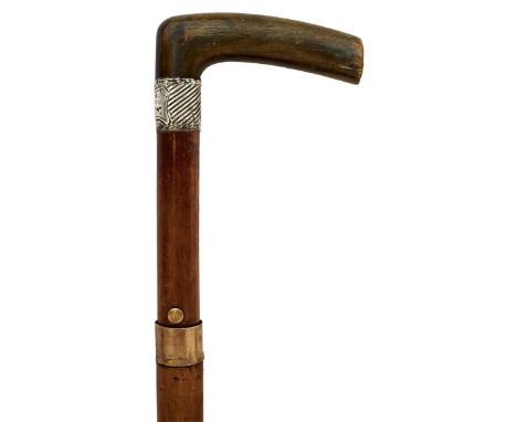 A 19TH CENTURY SCOTTISH SWORD STICK, the horn handle with yellow metal Hamilton clan crest, above white metal collar engraved