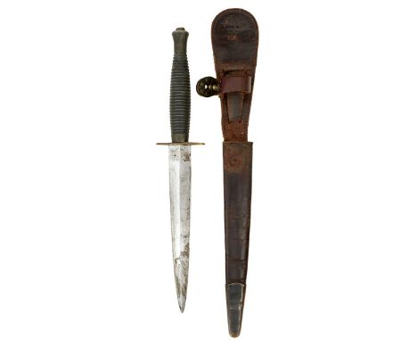 A THIRD PATTERN COMMANDO KNIFE OR DAGGER, 17cm flattened diamond section blade, regulation ribbed alloy grip with brass cross