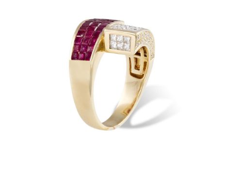 A DIAMOND AND RUBY DRESS RINGOf undulating crossover design, one terminal set with graduating square calibré-cut rubies, the 