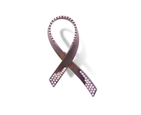 A DIAMOND AND TITANIUM RIBBON BROOCH, BY MARGHERITA BURGENERThe very light purplish-pink titanium crossover ribbon, accented 