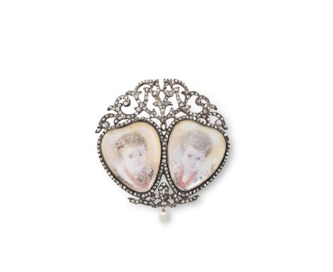 AN ANTIQUE MINIATURE PORTRAIT AND DIAMOND PENDANT/BROOCH, CIRCA 1880Set with two heart-shaped miniatures, each of a girl, wit