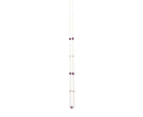A RUBY AND DIAMOND NECKLACEThe fine box-link chain, spectacle-set with alternating round shaped diamonds and rubies, mounted 