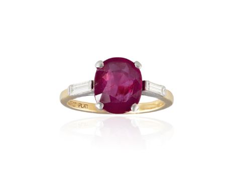 A RUBY AND DIAMOND RINGThe cushion-shaped ruby, weighing 3.20cts, within a four-claw setting, between two baguette-cut diamon