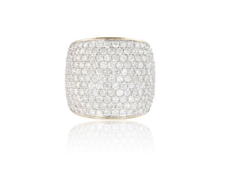 A DIAMOND DRESS RINGOf bombé style, pavé-set with round brilliant-cut diamonds to the front, mounted in 18K gold, diamonds ap