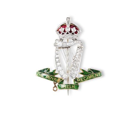 A DIAMOND AND ENAMEL REGIMENTAL SWEETHEART BROOCH FOR THE ROYAL IRISH REGIMENTIn the form of the regimental insigna, the crow
