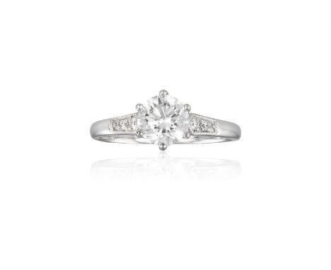 A DIAMOND SINGLE-STONE RINGThe round brilliant-cut diamond, weighing 1.00ct, within a six-claw setting and between similarly-