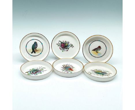 Delicately designed and hand painted grooved edge dish. Each created with a bird or shell in soft colors in center. Gilt rim 