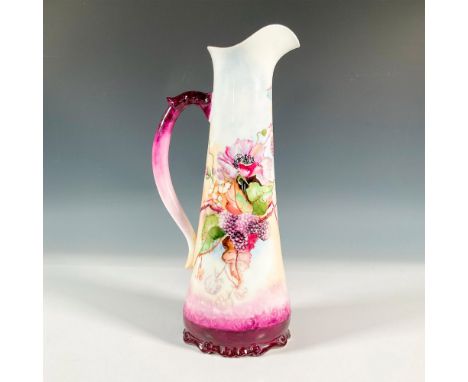 A beautiful purple glaze pitcher decorated with blackberries and purple blossoms. AK D France backstamp on base. Dimensions: 