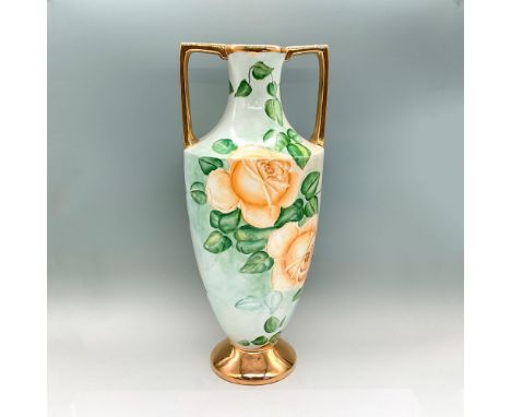 Tall vase with peach colored roses, bright green leaves, light blue background; gold handles, base and rim. J.P.L. backstamp.