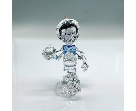 Clear faceted crystal figure of the character that transformed from wood to a real boy. Created to celebrate the 70th anniver