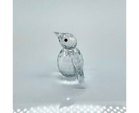 Clear faceted crystal figure of mini penguin with black eyes. Swarovski etched mark. This item has its original box: 2.5"H x 
