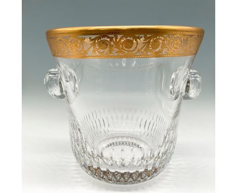 Clear crystal with gilt banded thistle design around rim and spearhead cut design on base with thick knob crystal handles. Sa