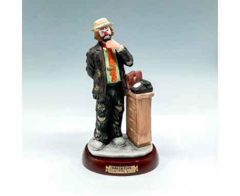 Part of the EKJ Collection - Dressed in better attire with telephone and briefcase nearby. Flambro Imports backstamp. This it
