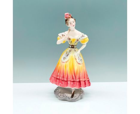 A porcelain figure of a young woman in a pink and yellow colored dress decorated with a white floral scarf. Goldscheider back