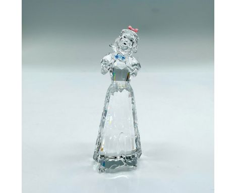 Sparkling faceted figure of Snow White holding a blue crystal, pink bow accent in her hair. Swarovski etched mark. This item 