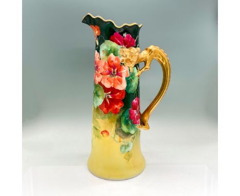 Striking tall pitcher with hand painted magenta and coral flowers, bright green leaves, gold dragon handle. Signed Duval. J.P