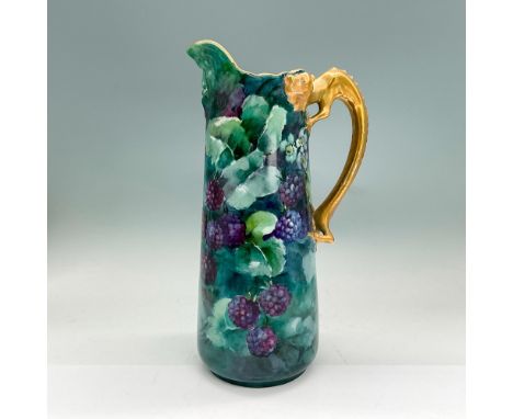 Decorative pitcher with hand painted dark purple berries, teal leaves and background, gold dragon handle. Dimensions: 6"L x 4
