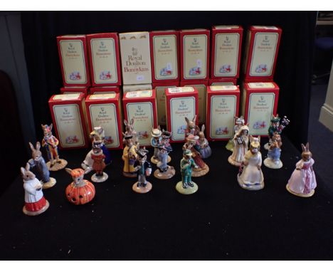 A COLLECTION OF ROYAL DOULTON BUNNYKINS FIGURINES to include; 'Britannia', 'School Master', 'Piper', 'Horn Piper', 'Mandarin'