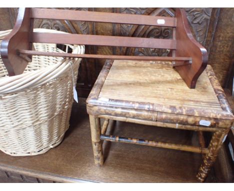 A BAMBOO STAND, A BOOK TROUGH, AND A WICKER BASKET 