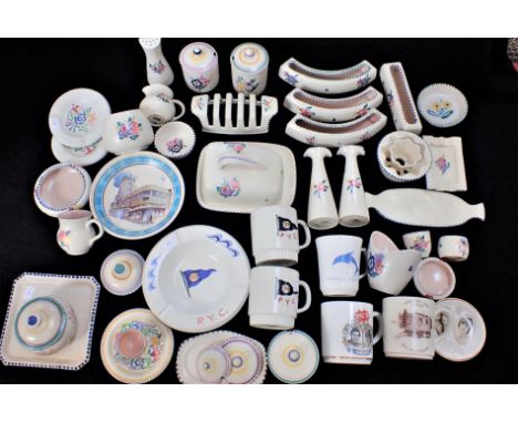 A COLLECTION OF POOLE POTTERY including flower holders, Poole Yacht Club items, commemoratives, odd lids, etc