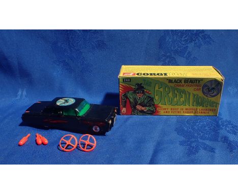 A 'CORGI TOY' NO.268, THE GREEN HORNET'S 'BLACK BEAUTY' with three missiles and two flying disks, (damage to 'Britt Reid' fig
