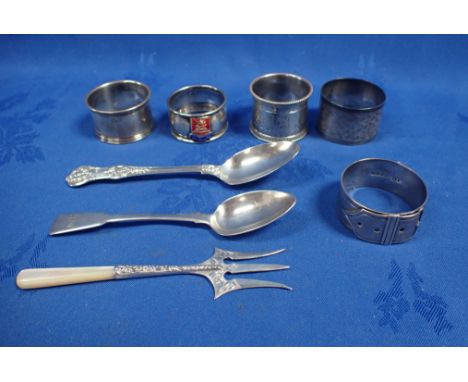 A VICTORIAN NOVELTY SILVER BELT BUCKLE NAPKIN RING Sheffield 1868 James Dixon &amp; Sons Ltd, together with four other silver