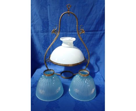 A PAIR OF PALE BLUE HOLOPHANE LAMPSHADES with pressed brass coronet mounts, 22.5cm diam. with a Victorian 'harp' lamp frame a