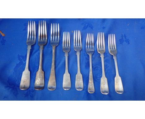 A PAIR OF VICTORIAN FIDDLE DINNER AND TABLE FORKS George William Adams, London 1855, together with another Victorian Dinner f