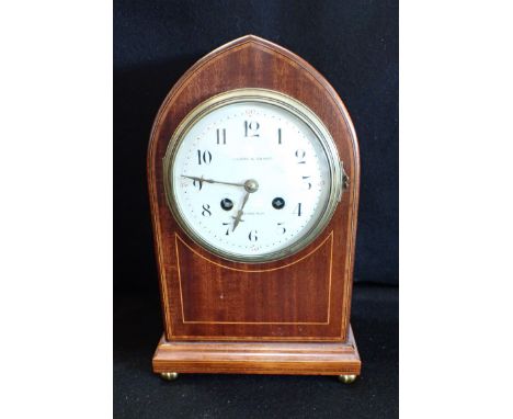 AN EDWARDIAN MAHOGANY CASED MANTEL CLOCK by Wilson &amp; Sharp, Edinburgh, French balance movement, striking on a gong 28cm h