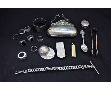 A SILVER NOVELTY JOCKEY CAP CADDY SPOON marked 'sterling', a hallmarked paper clip, ingot, and other silver and white metal i