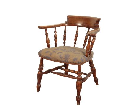 A VICTORIAN BEECH 'CAPTAINS CHAIR' "the seat with floral print silk covers, on turned legs and stretchers, 80cm high x 68cm w