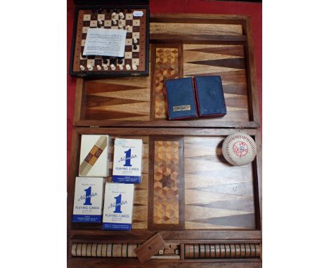 A PARQUETRY BACKGAMMON SET, A 'YANKEES' BASEBALLl travel chess set and other items