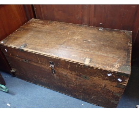 A LARGE WOODEN TRAVELLING TRUNK zinc lined 105cm wide (some damage to metal mounts)