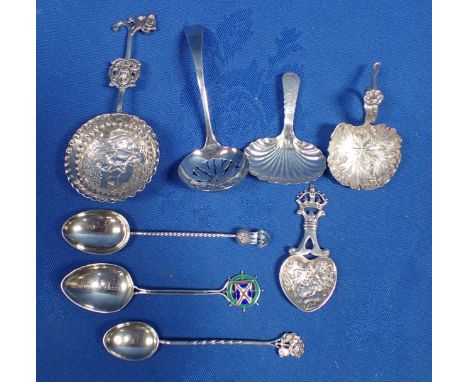 A VICTORIAN SILVER TEA CADDY SPOON together with four other silver tea caddy spoons and three silver teaspoons
