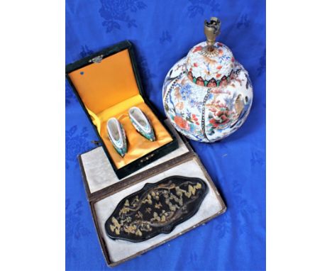 A CHINESE MOULDED INK BLOCK gilt and painted, with character inscription 24cm long (cased), with a ginger lamp, and a cased p