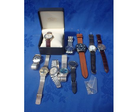 A ROTARY WINDSOR BROWN STRAP WATCH with a collection of men's watches