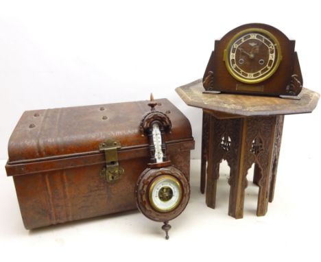 Anglo-Indian heavily carved hardwood table, metal trunk, mantle clock with English movement and barometer (4)