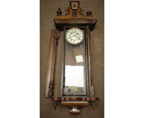 Late 19th century walnut cased Vienna wall clock, twin train movement striking on coil, with weights and pendulum