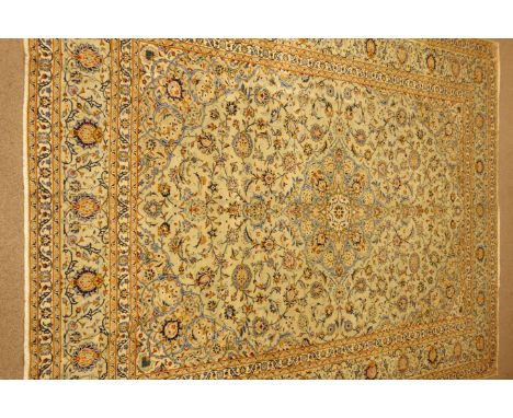 Kashan light green ground, central medallion, floral and foliate field, repeating border, 422cm x 311cm 