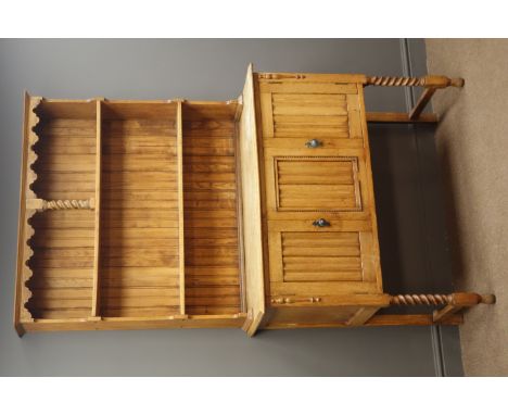 Early 20th century light oak dresser, two tier plate rack above two panelled doors enlcosing a shelf, on barley twist support