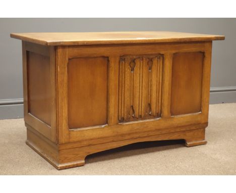 Mid 20th century oak blanket box, planked top with linenfold centre panel front on bracket feet, W92cm, H55cm, D48cm