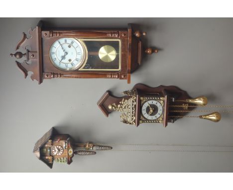 Small painted wood cuckoo clock, 20th century Dutch style figural wall clock and a 'Lincoln' 31-day wall clock