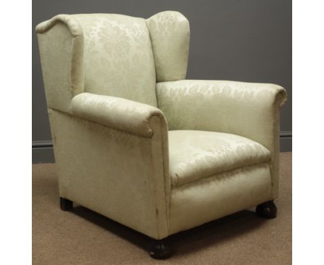 Early 20th century wingback armchair, upholstered in light green Damask fabric