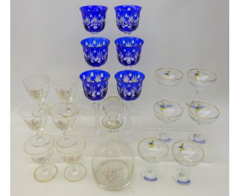 Six 1970s Babycham glasses, six engraved layered blue glass hock glasses, six wine glasses and a decanter decorated with whit