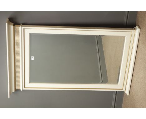 Rectangular bevel edged mirror, projecting cornice above fluting, gold and ivory finish, W85cm, H128cm