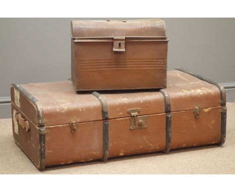Early 20th century travelling trunk, hinged lid with latches, leather carrying handles, (W91cm, H31cm, D54cm), and a tin trun